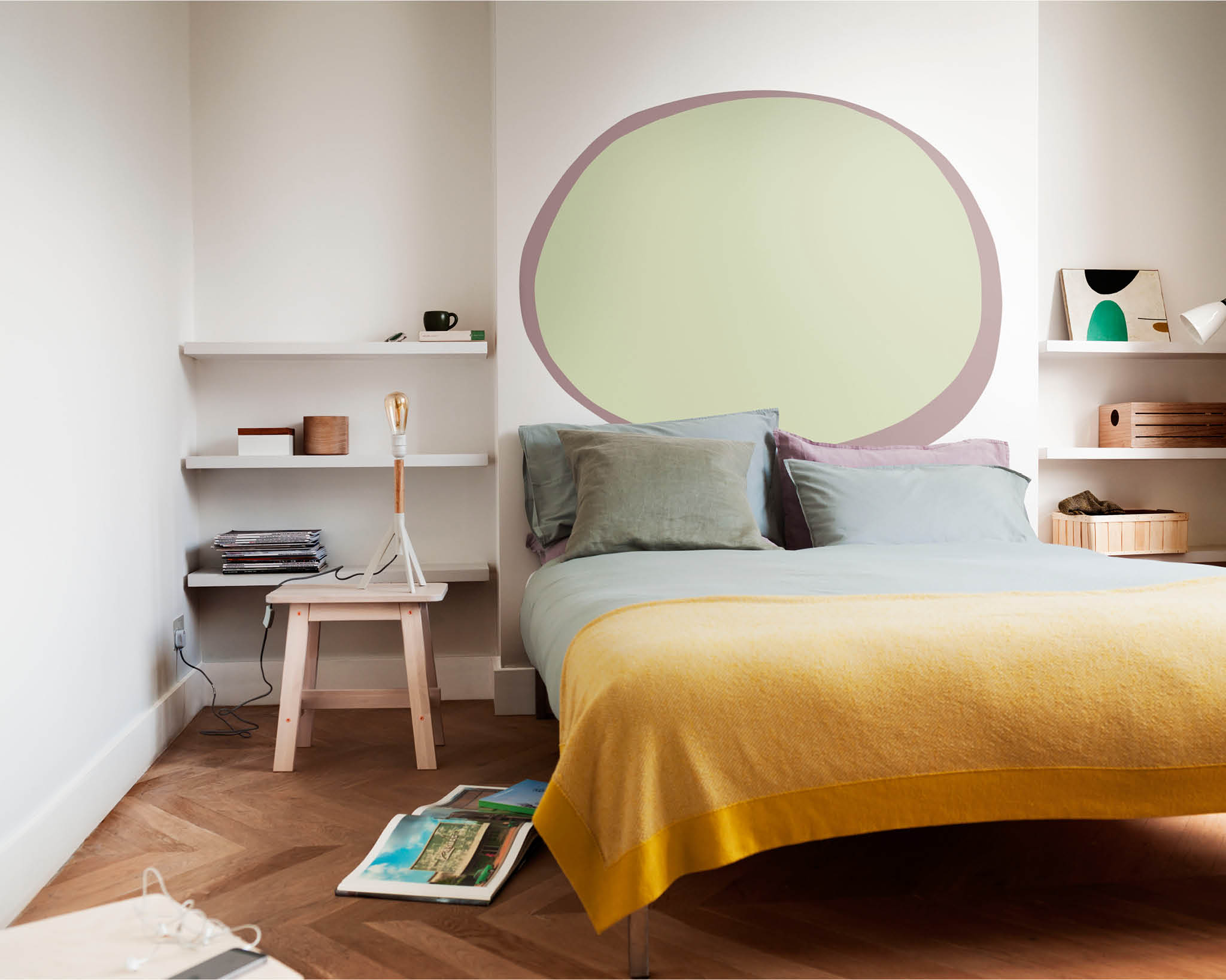 Bedroom with a painted oval on the wall Bedroom with a painted oval on the wall