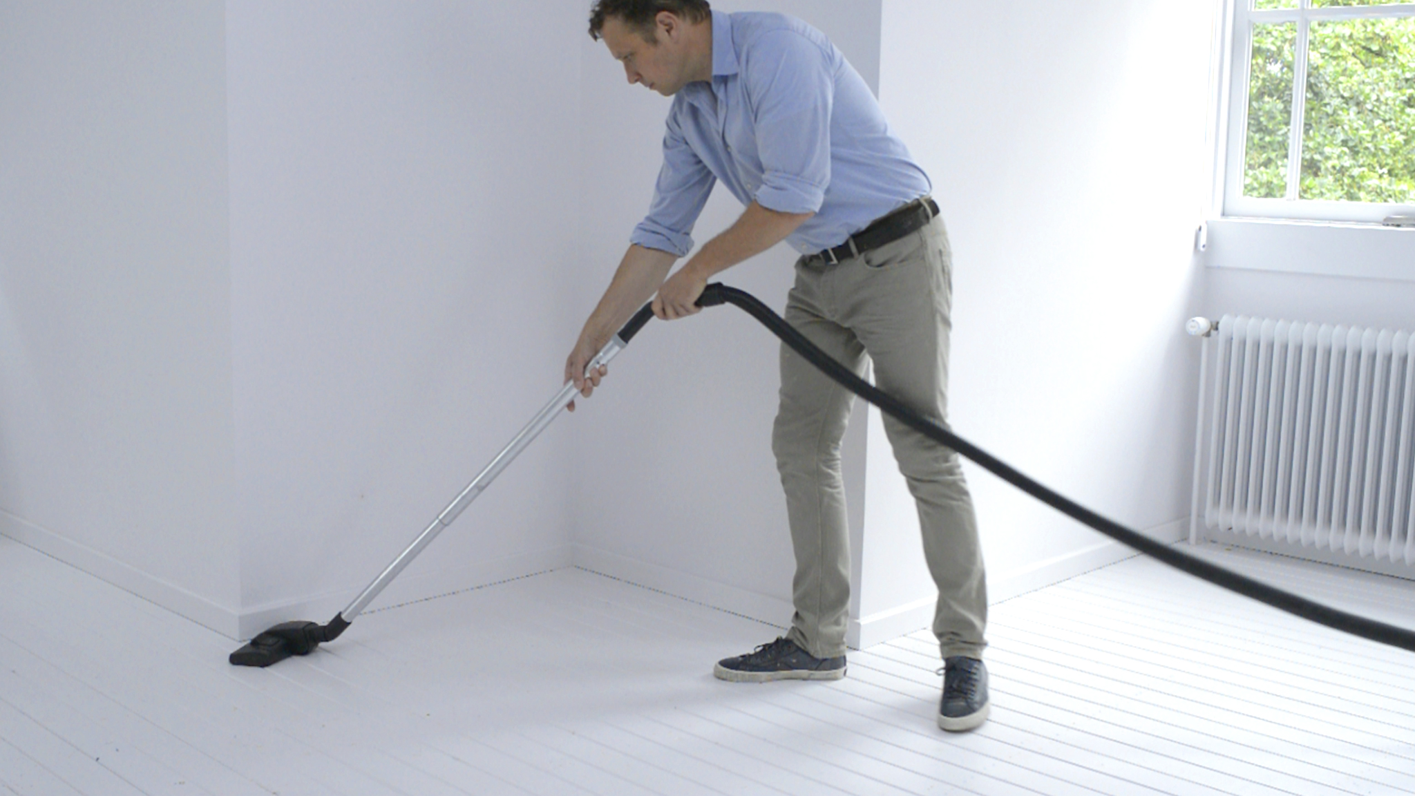 Vacuuming the floor Dulux_painting_wooden_flooring_UK_4